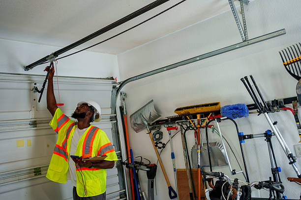 Professional Garage Door Panel Replacement technician working in Wilson, OK